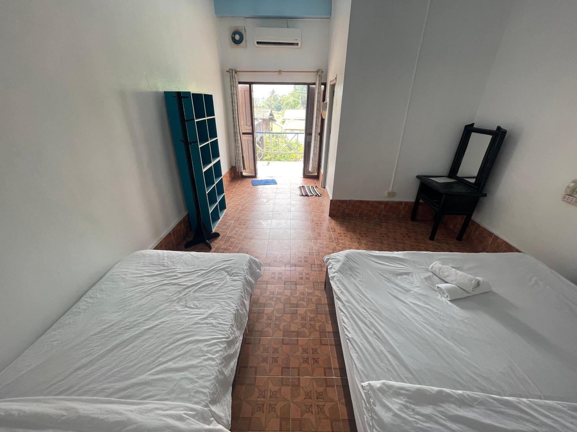 Blue Sunset Hostel Vang Vieng Habitación foto